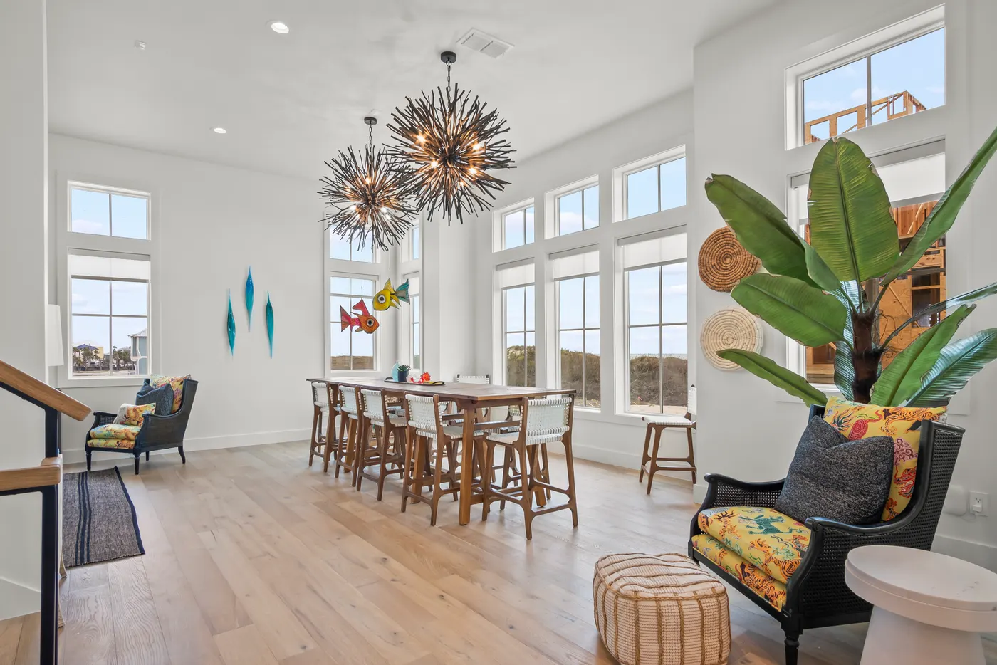 Dining room and bar with sculptural chandeliers
